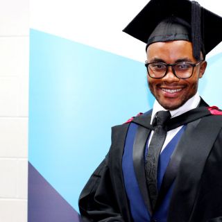 Monga Mukasa with his University of Canberra degree