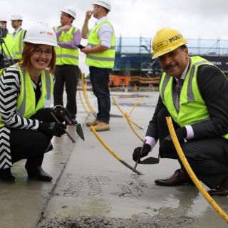 UC Public Hospital cements construction milestone