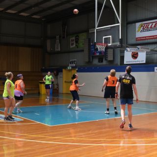 Kelsey Griffin takes part in a social game of basketball