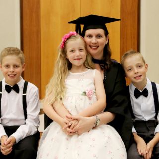 UC graduate Tanya Stiller with her three children