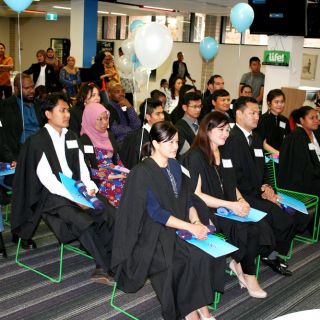 UC Australia Award scholarship students celebrate completing their degrees at a farewell ceremony