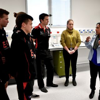 Eastlake Demons players tour the Melanie Swan Memorial Translational Centre