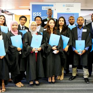 UC Australia Award scholarship students celebrate completing their degrees at a farewell ceremony