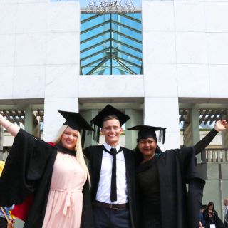 Students celebrate graduating from UC at Parliament House